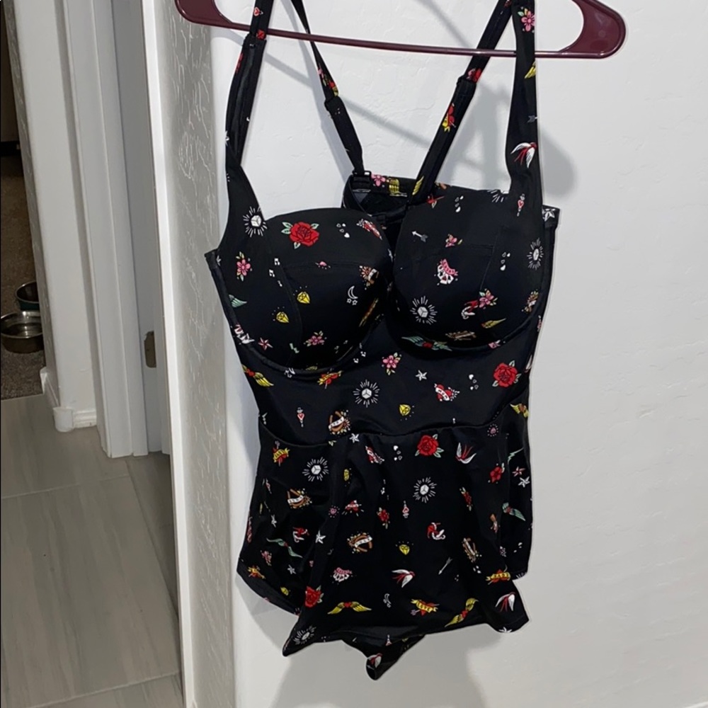 Torrid Bathing Suit with the one piece and skirt.